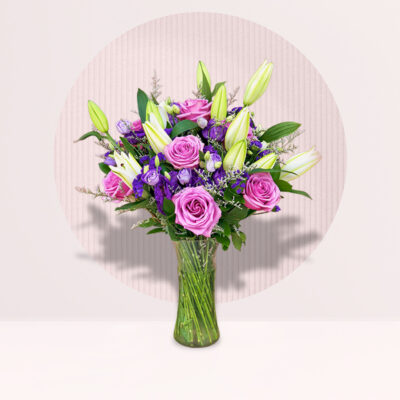 Lavish Purple Roses with Lily in Vase