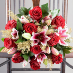 Bouquet of pink Lilies and Red Roses.