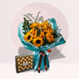 a bouquet of sunflowers and a box of Ferrero Rocher chocolates.